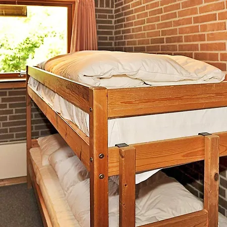 4 Person In Henne Casa de Férias *